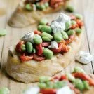 Crostini with Marinated Broad Beans, Peppers and Ricotta Recipe: Cook Vegetarian Magazine