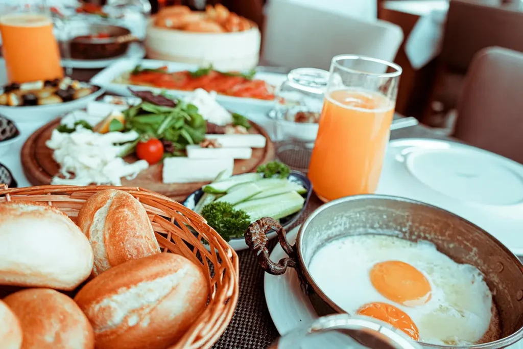 Here are 10 home brunch ideas for healthy and balanced meals:

1. Avocado toast with poached eggs and cherry tomatoes.
2. Greek yogurt parfait with mixed berries and granola.
3. Quinoa salad with cucumbers, bell peppers, and feta cheese.
4. Smoothie bowl topped with nuts and seeds.
5. Whole grain pancakes with banana and maple syrup.
6. Omelette with spinach, mushrooms, and low-fat cheese.
7. Chia seed pudding with coconut milk and pineapple.
8. Sweet potato hash with bell peppers and onions.
9. Overnight oats with almond milk, chia seeds, and apples.
10. Whole grain toast with almond butter and sliced strawberries.